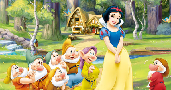 Snow White smiling gently in her iconic yellow and blue dress