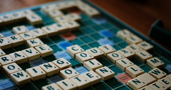 Scrabble tiles arranged on a classic game board