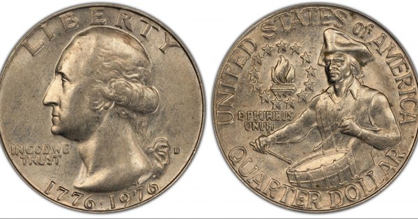 Commemorative bicentennial quarter with drumline design in museum case.